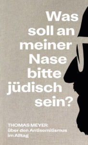 Buchcover: "Was soll an meiner Nase bitte jüdisch sein?". Silhouette von Thomas Meyer auf grauem Hintergrund.