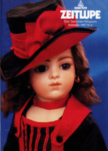 Zeitlupe Cover von 1987: eine Puppe in einem roten Kostüm mit schickem Hut auf blauem Hintergrund.